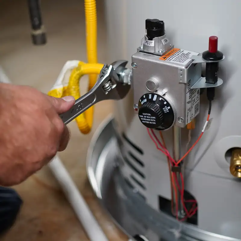 close up of a gas line on a water heater