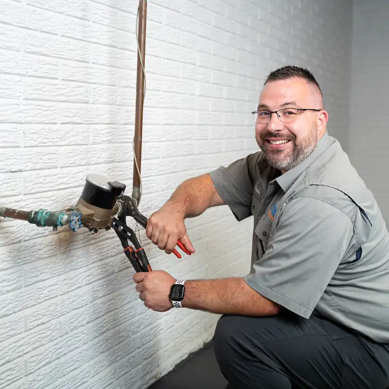 plumber working on a gas line